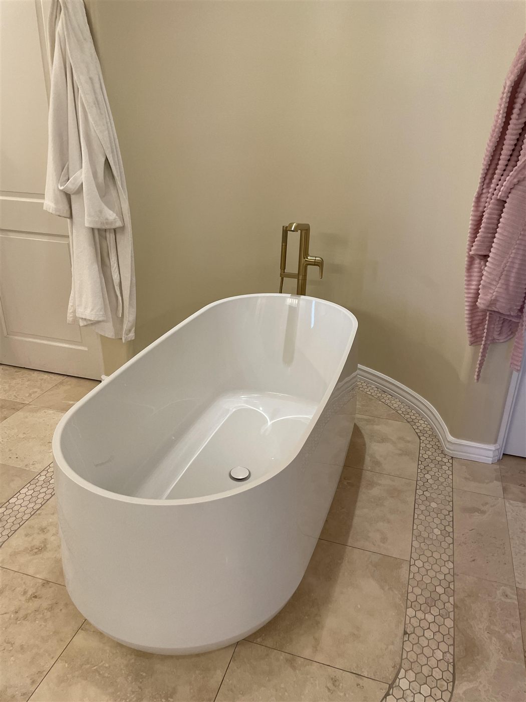 About Freestanding soaking tub installation with floor-mount tub filler