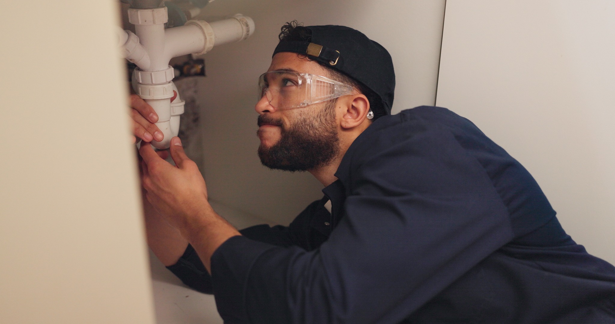 Pipe Patrol licensed plumber at work in an Arizona home